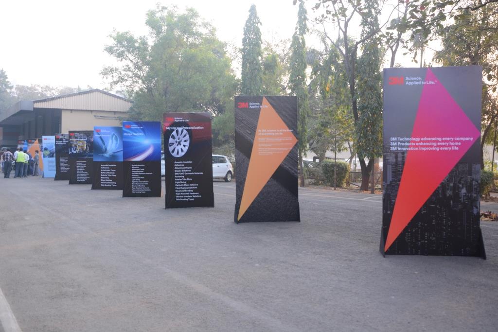 Physical signage setting up the stage for a corporate event.