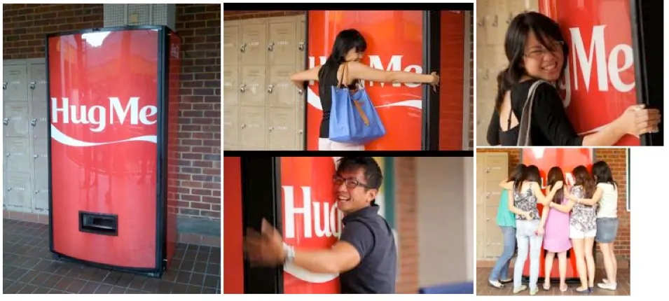 Coca-Cola’s revolutionary Hug Me vending machines caused quite a stir. We see happy-looking people hugging the machines.