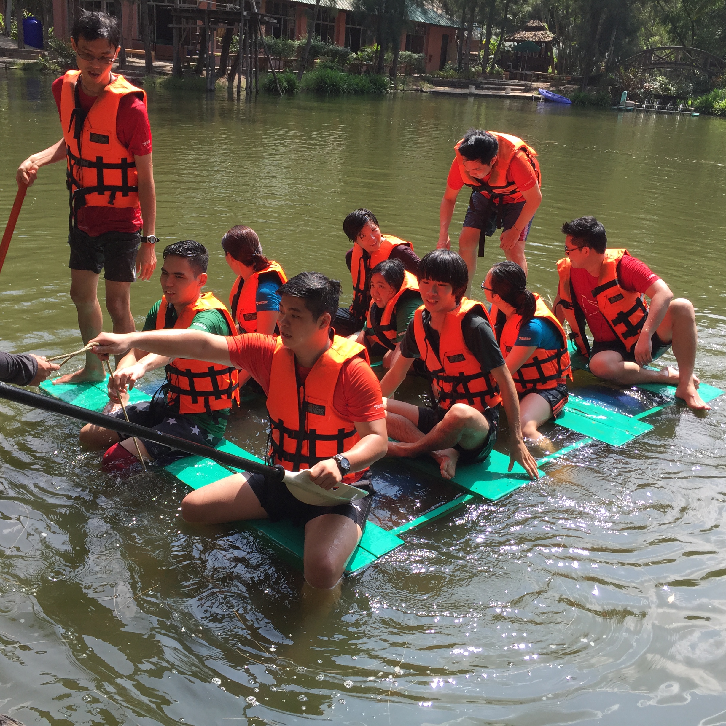 A corporate team-building event where attendees competed as teams in a water sport activity.
