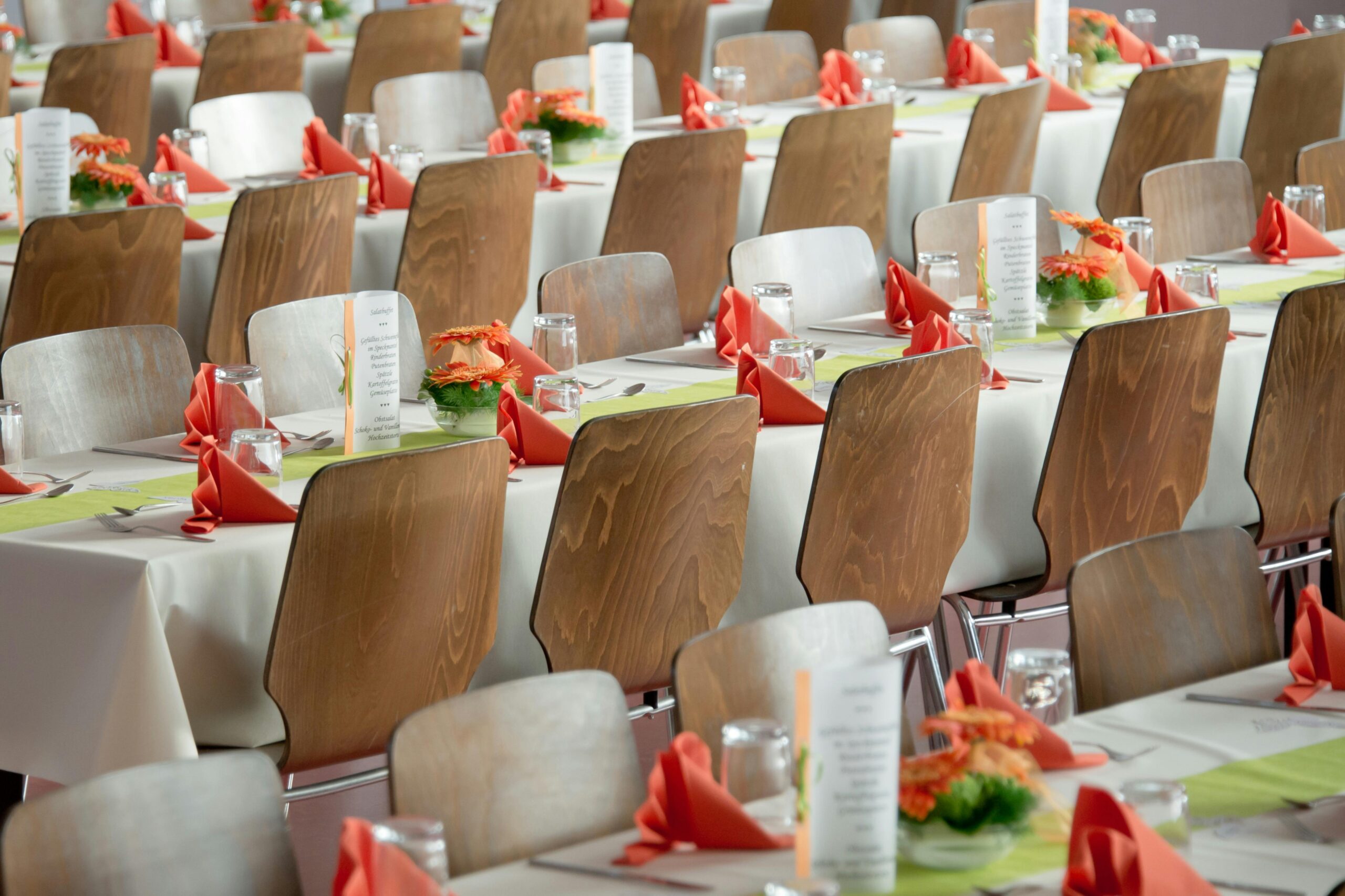 Elegant ballroom prepared for a corporate event by an experienced event organiser
