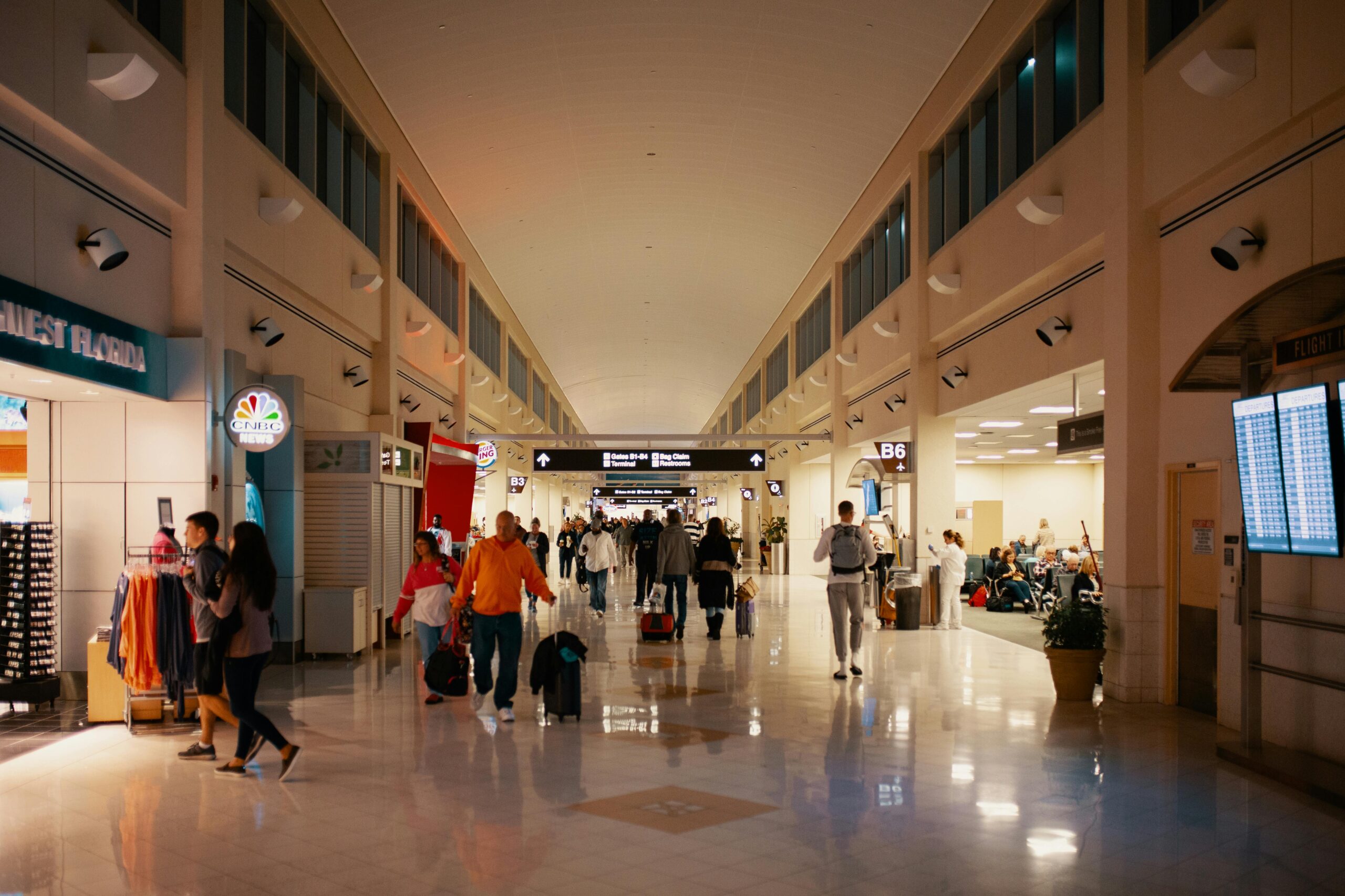 Attendees arriving at airport for shuttle service to corporate events