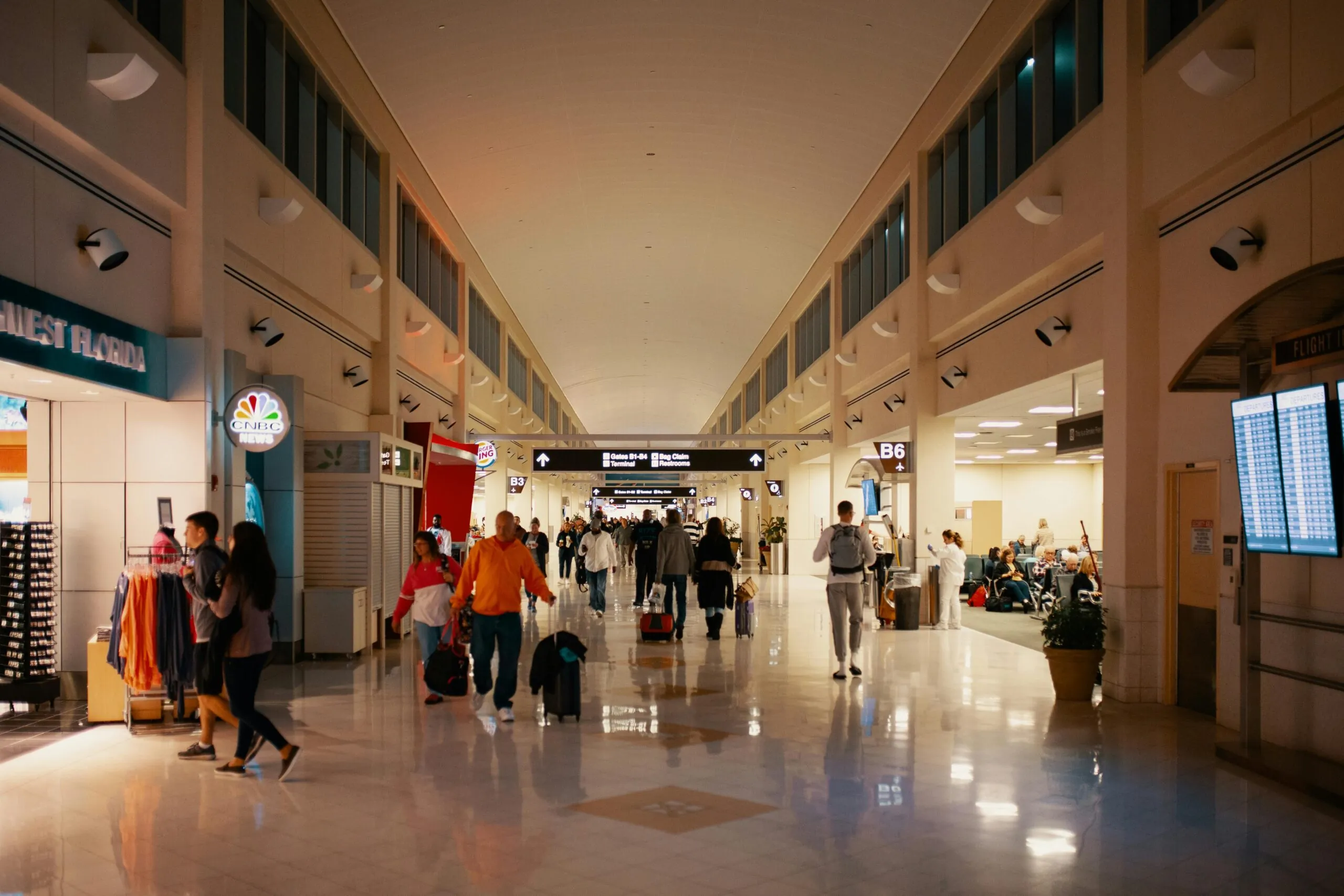 Attendees arriving at airport for shuttle service to corporate events