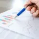 Close-up of a laptop screen displaying a survey spreadsheet, symbolising data collection for strategic event planning.
