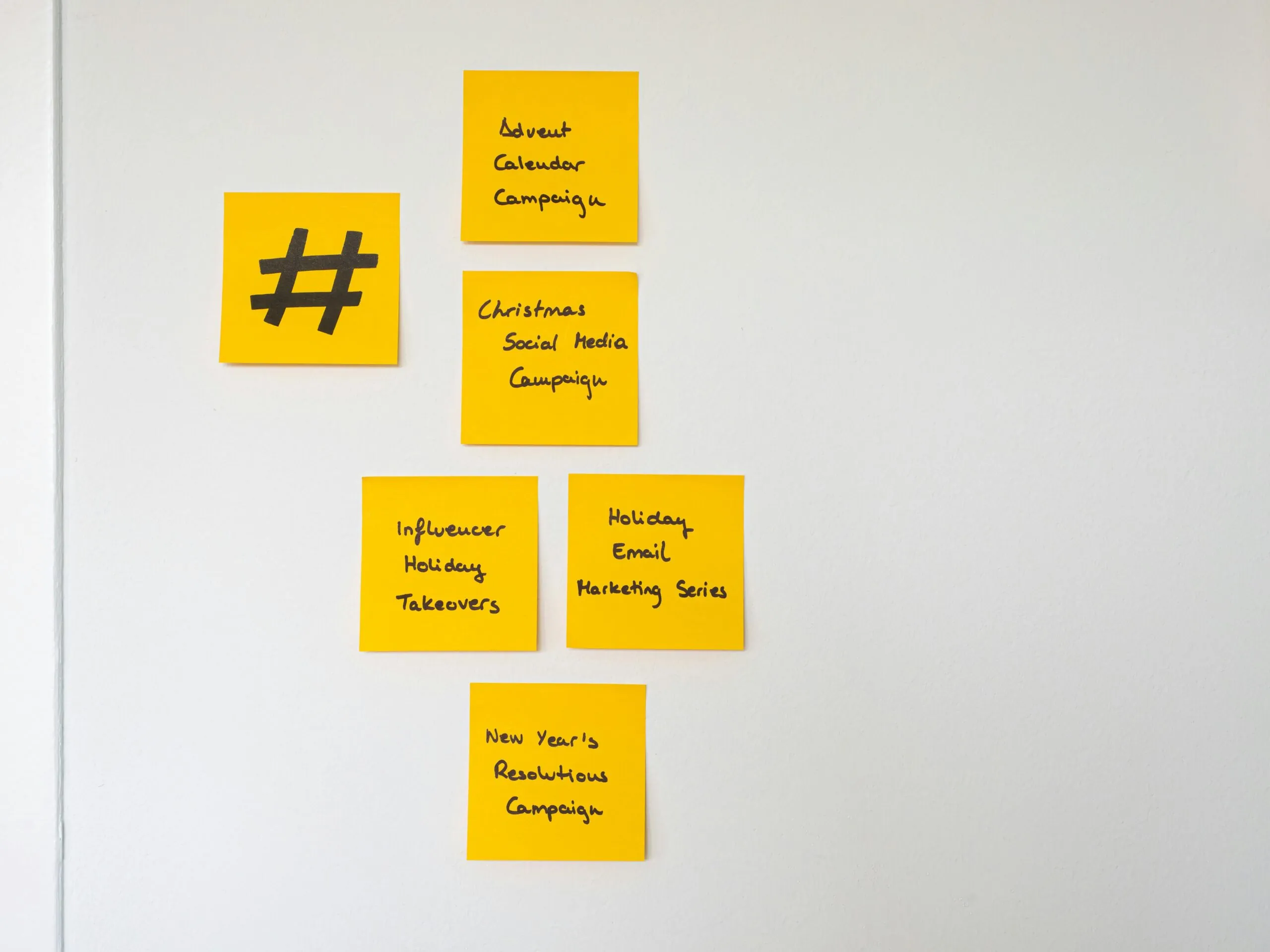 Sticky notes and planning sheets arranged on a table, illustrating the process of turning data into event strategy.