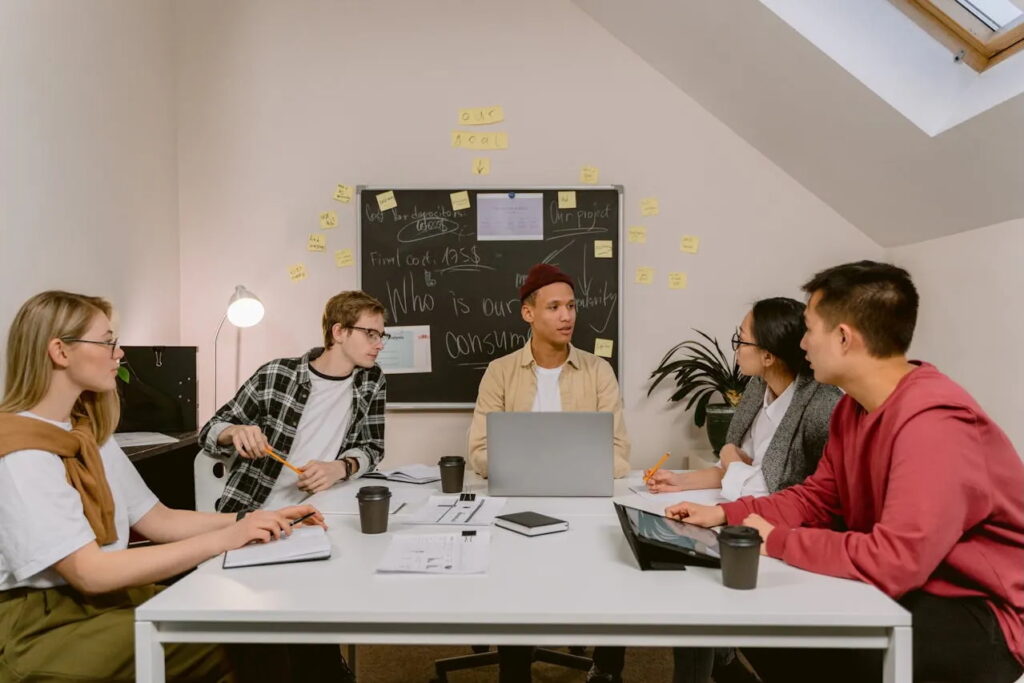 Event organisers reviewing attendee feedback together to plan improvements for future corporate events.