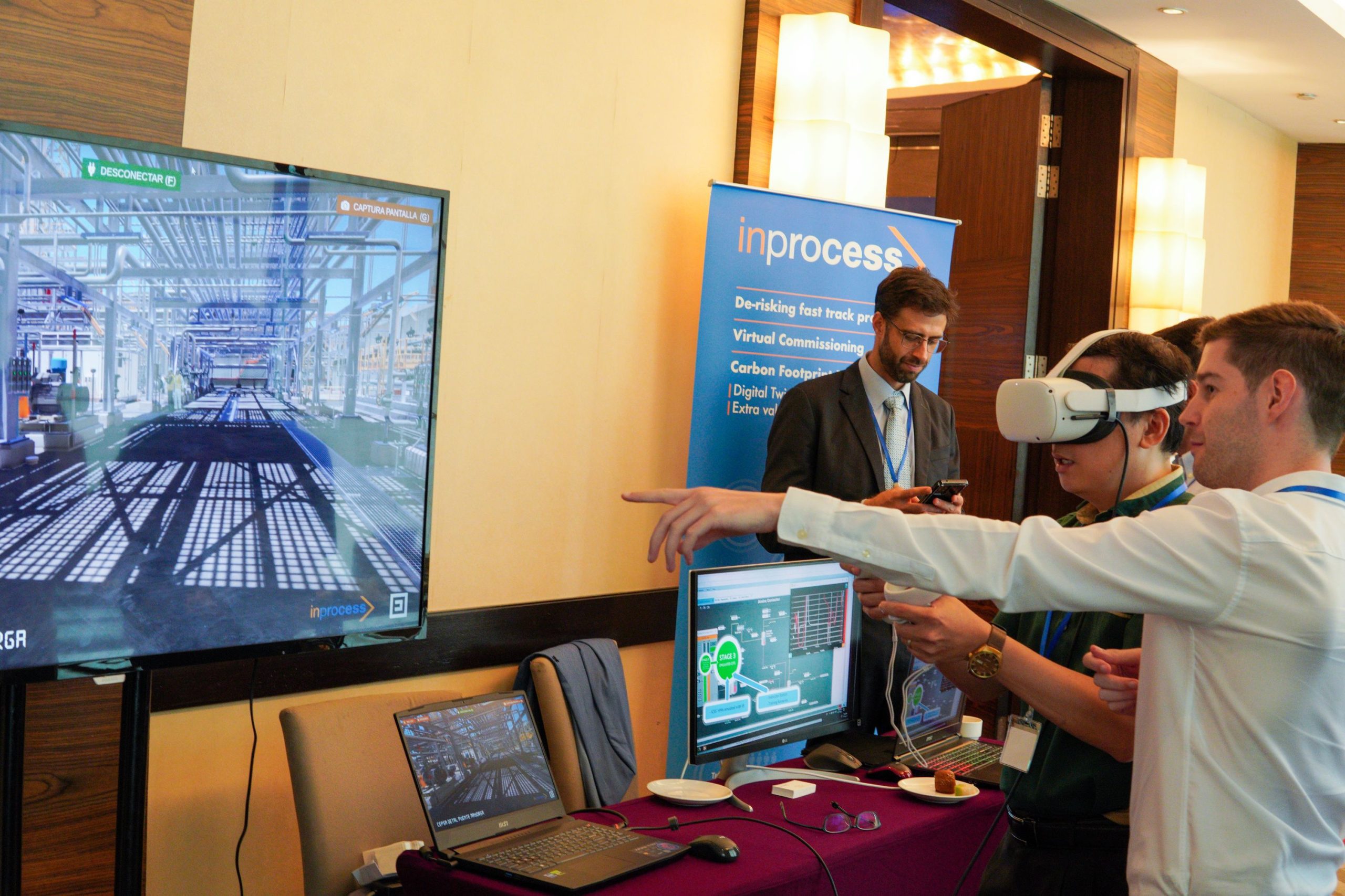 Attendees experiencing an interactive product launch demonstration using immersive technology at a corporate event.