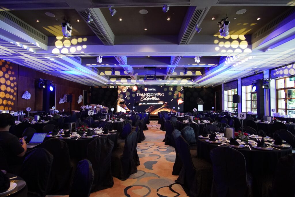 Fully set up corporate gala dinner in a ballroom, all managed by Eventive