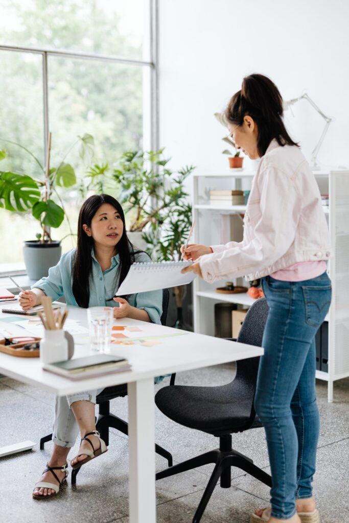 Corporate event management professionals developing sustainability goals and planning requirements for a business event.