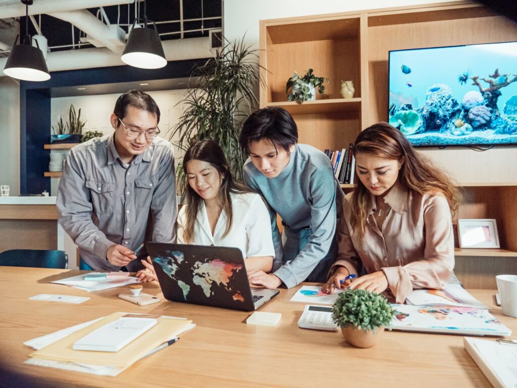 Marketing team planning a product launch campaign and audience outreach for a corporate event in Singapore.