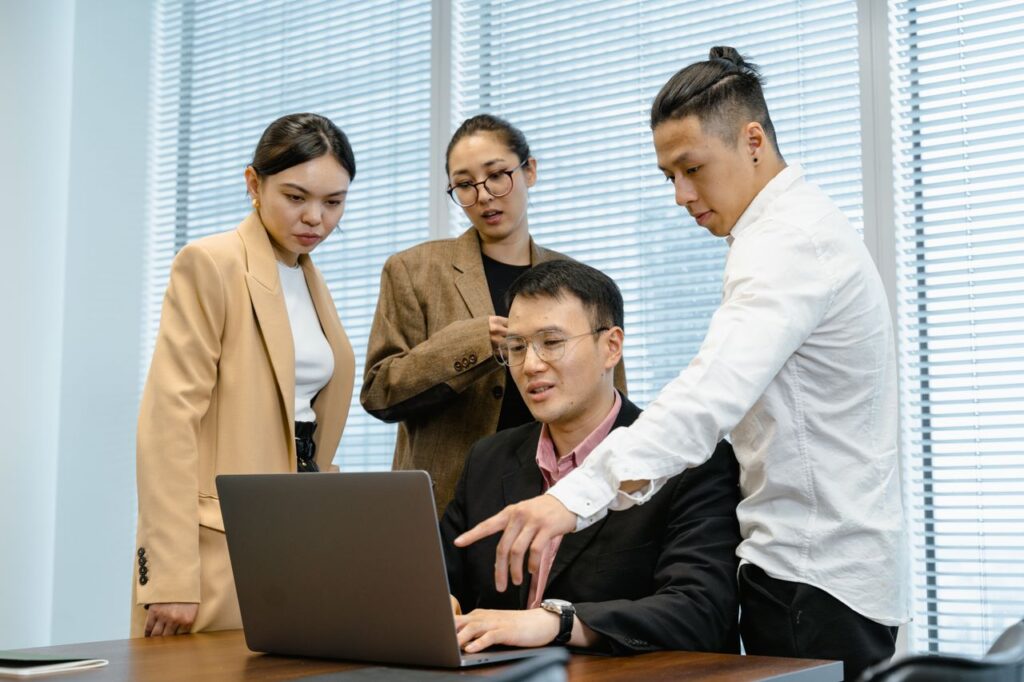 Corporate event marketing team planning personalised event content and attendee communications with AI tools.