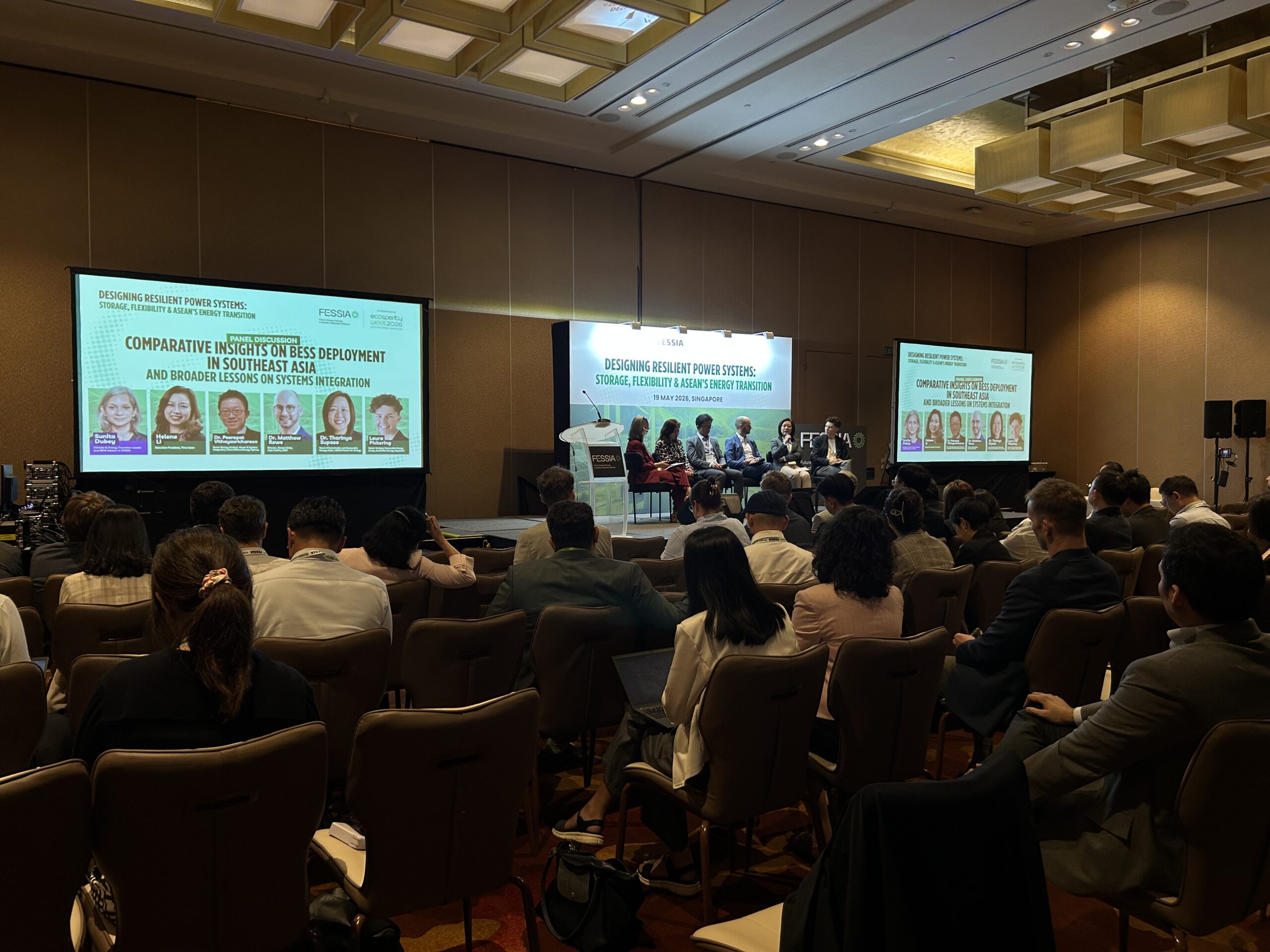 A group of professionals gathered in a conference, organised by a corporate event management company