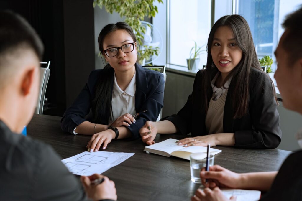 Participants collaborating during a corporate event management workshop at an intimate micro-event